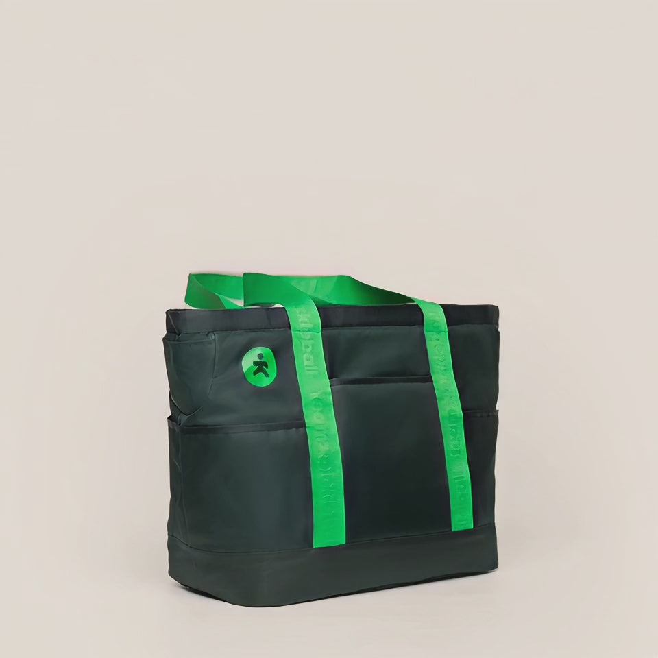 Team Pickleball RePlay Tote Bag in the color Fern. Short video of the front of the bag as is lifts off the ground.